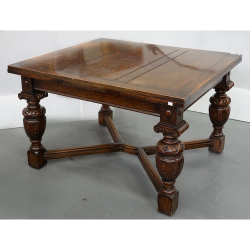 608 - A VICTORIAN CARVED OAK DRAW LEAF DINING TABLE ON STRETCHER BASE, 77CM H; 107 X 121CM