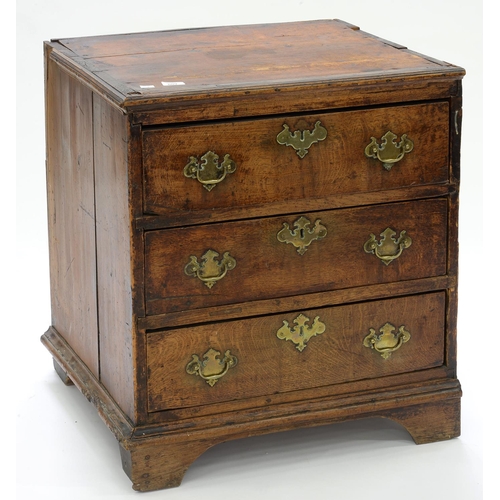 609 - A GEORGE III OAK DWARF CHEST OF DRAWERS WITH BRASS HANDLES, ON BRACKET FEET, 71CM H; 64 X 55CM