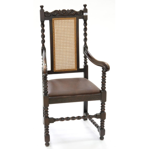 622 - A VICTORIAN STYLE CARVED OAK ELBOW CHAIR WITH SPIRAL TURNED UPRIGHTS