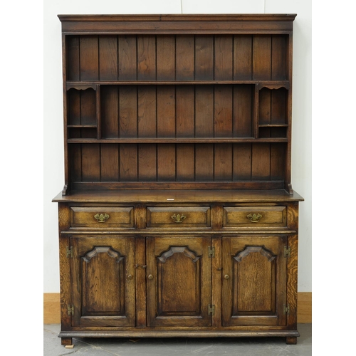 644 - AN ANTIQUE STYLE PANELLED OAK DRESSER AND RACK, 187CM H; 139 X 45CM