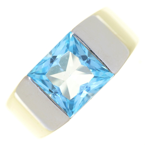 56 - CARTIER. A BLUE TOPAZRING, IN 18CT WHITE GOLD, SIGNED, FRENCH CONTROL MARKS, DATED 1997, 13G, SIZE I... 