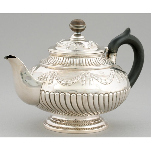 103 - AN IRISH GEORGE IV SILVER TEAPOT  of globular form,  chased with festoons, silver banded wood knop, ... 