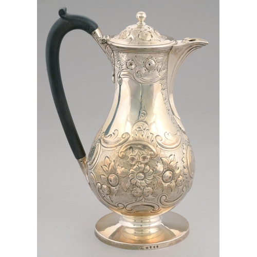 106 - A GEORGE III SILVER LIDDED JUG  later chased and engraved with armorials, 24cm h, maker's mark rubbe... 