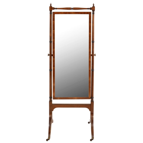 604 - A MAHOGANY CHEVAL MIRROR, C1900  with ring turned frame and brass capped castors, 176cm h,... 