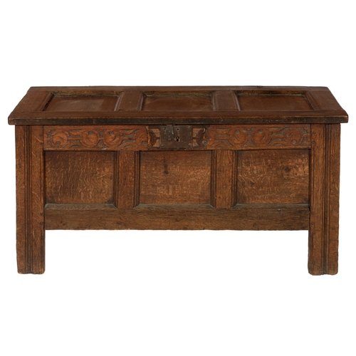 625 - AN OAK CHEST, 18TH C   of panelled construction, the frieze carved with strapwork, 56cm h; 48 x 109c... 