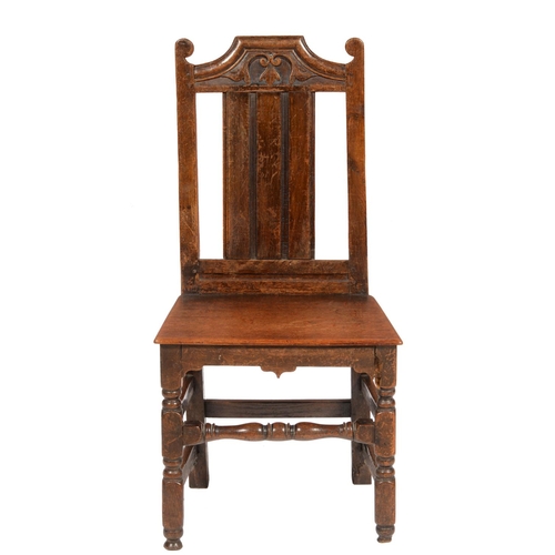 637 - A JOINED OAK CHAIR, 19TH C  with channelled splat and boarded seat, seat height 43cm... 