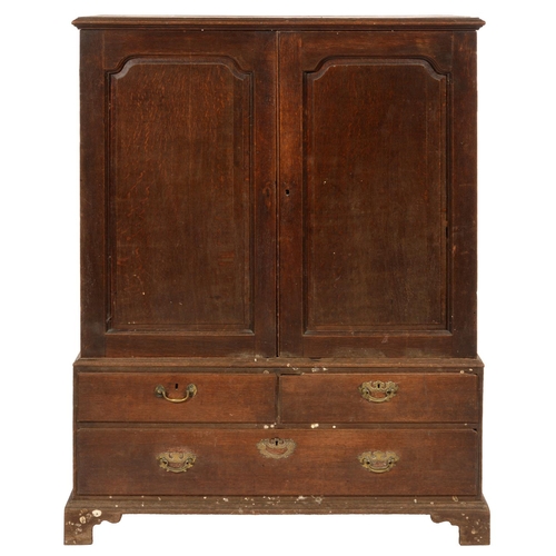 640 - A GEORGE III OAK PRESS, LATE 18TH C  retaining two linen trays enclosed by doors with ogee arched ra... 