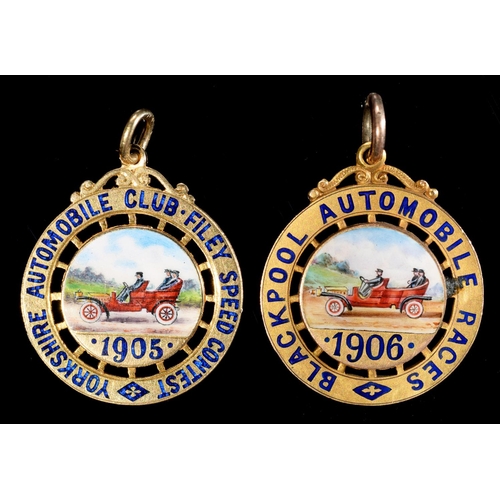 73 - VINTAGE MOTORING.  TWO GOLD AND ENAMEL PRIZE WATCH FOB MEDALS painted with a veteran motorcar above ... 