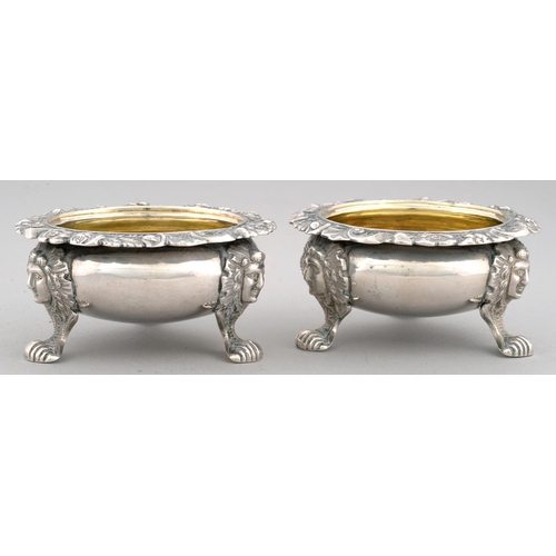 98 - A PAIR OF SCOTTISH VICTORIAN SILVER SALT CELLARS  with foliate chased rim and mask feet, 8.5cm diam,... 