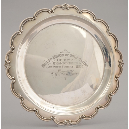 198 - GOLFING INTEREST. A GEORGE V SILVER SALVER WITH CAVETTO AND 'C' SCROLL BORDER, ON BUN FEET, ENGRAVED... 