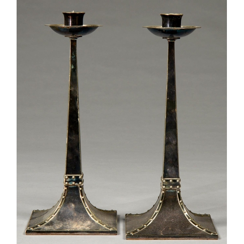 208 - A PAIR OF ARTS AND CRAFTS EPNS CANDLESTICKS, C.1900, ON FLARED SQUARE BASE, 31CM H