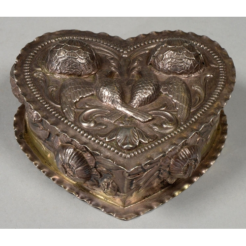 210a - A GERMAN SILVER HEART SHAPED REPOUSSE BOX, C.1900, EMBOSSED AND CHASED WITH BIRDS AND FLOWERS, 16CM ... 