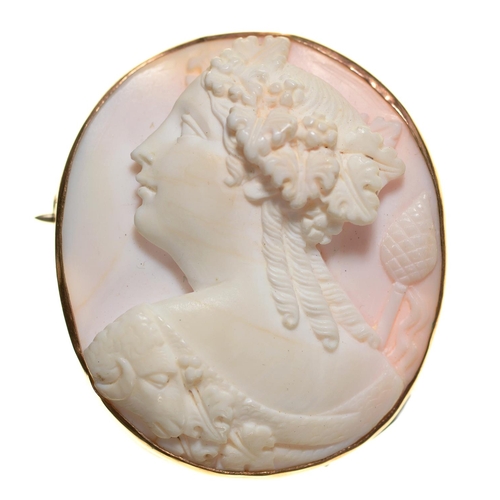 80 - A WHITE CORAL CAMEO, 19TH C, CARVED WITH THE HEAD OF A BACCHANTE WITH A THYRSUS, PLAIN GOLD MOUNT, 3... 