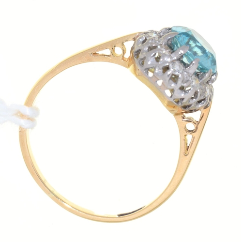 9 - A BLUE ZIRCON AND DIAMOND CLUSTER RING, GOLD HOOP, INDISTINCTLY MARKED, 2.9G,   SIZE K