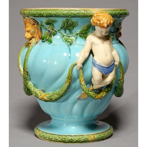 916 - A Mintons spirally lobed ogee majolica jardiniere, c1870, with horn handle and applied with festoons... 