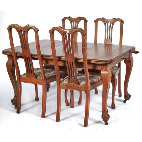 1466 - An oak single leaf extending dining table, c1930's, the rounded rectangular top above cabriole legs ... 