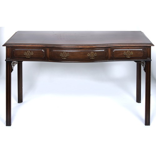 1468 - A Victorian serpentine mahogany serving table, late 19th c, in George III style, the top with moulde... 