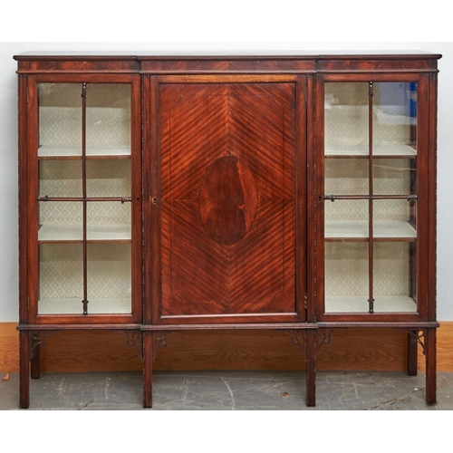 1477 - An Edwardian mahogany breakfront display cabinet, c1910, the panelled centre door with central figur... 