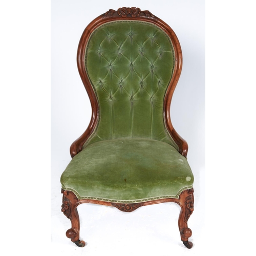 1480 - A Victorian walnut nursing chair, c1870, the top rail carved with flowerheads and leafage on a matte... 