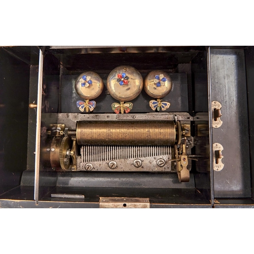 1030 - A Swiss bells-in-sight musical box, late 19th c, playing eight airs as listed by hand on the origina... 