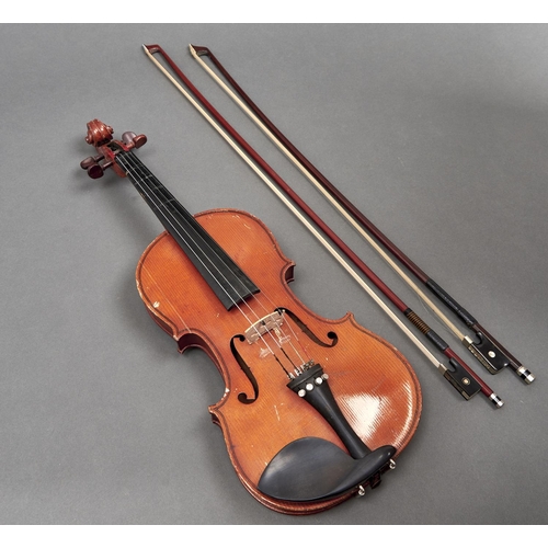 1049 - A violin,  unlabelled, length of back 35.5cm and two violin bows