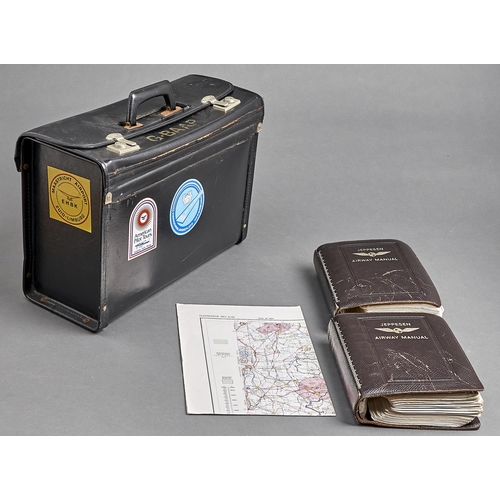 1079 - Flying. An aircraft pilot's black leather flight case, c1970/80, the lid painted G-BAAP, containing ... 