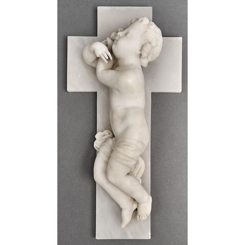 1086 - An Italian alabaster carving of a cherub and crucifix, the reverse with trade label for Giuseppe And... 