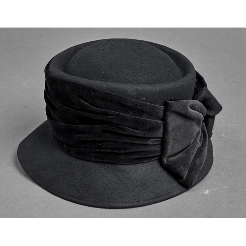 1101 - Millinery. A black felt lady's hat with velvet bow by Sandra Phillipps