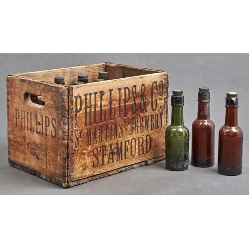 1115 - Brewarania. A stained pine crate from Phillips & Co St Martins Brewery Stamford, with twelve var... 