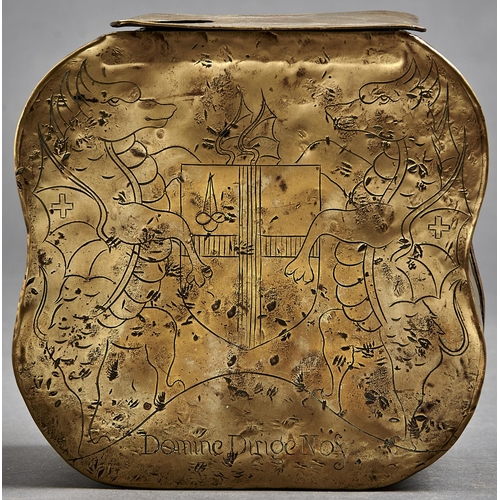 1121 - A sheet brass wall hanging box, of cushion outline with flat lid, the front engraved with armorials ... 