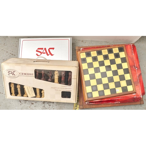 1207 - A Sherlock Holmes chess set by The Traditional Games Company Ltd, boxed (2), another chess set of fa... 