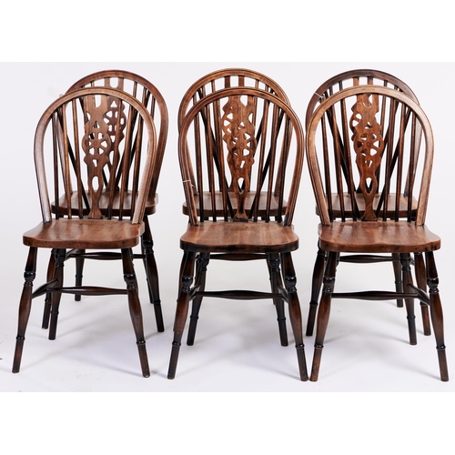 1450 - A set of six stained ash wheel back dining chairs, in Victorian style, seat height 46cm... 