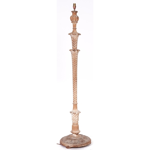 1498 - A limed pine floor lamp, crisply carved with overlapping acanthus leaves, 146cm h excluding fitment... 