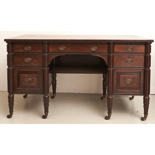 1551 - A George IV mahogany dressing table, c1830, fitted with drawers around a kneehole and flanked by cup... 