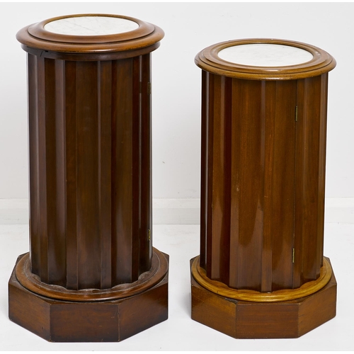 1583 - Two similar Victorian mahogany fluted pillar pot cupboards, late 19th c, with marble inset top, on o... 