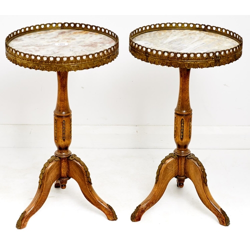 1607 - A pair of French giltmetal mounted limed wood tripod tables, with galleried marble top, late 20th c,... 