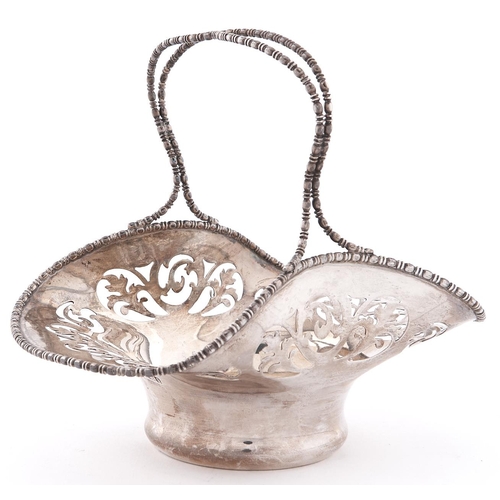 705 - A George V pierced silver bonnet basket, with entwined handle, 14cm h, by Fenton Bros Ltd, Sheffield... 