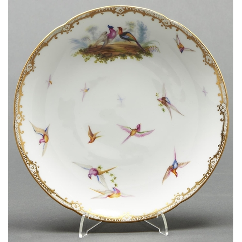 781 - An English porcelain dessert plate, c1860, painted in the manner of John Randall with birds, lobed g... 