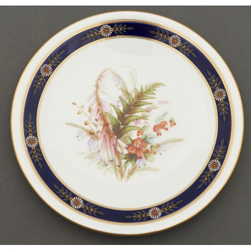 798 - A Royal Worcester plate, 1879, painted with heaths in cobalt and raised gilt border, rim gilt, 22.5c... 