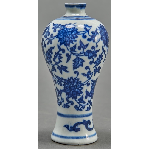 836 - A Chinese blue and white vase, meiping, decorated in the style of heaping and piling with lotus mean... 