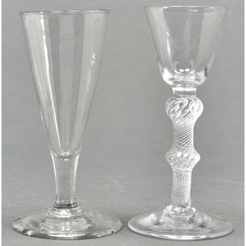 849 - A George II wine glass, mid 18th c, the rounded funnel bowl on single series air twist stem with upp... 