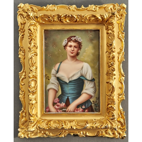 852 - A German porcelain plaque, c1900, painted with a young woman gathering roses, 15.5 x 10cm, red print... 