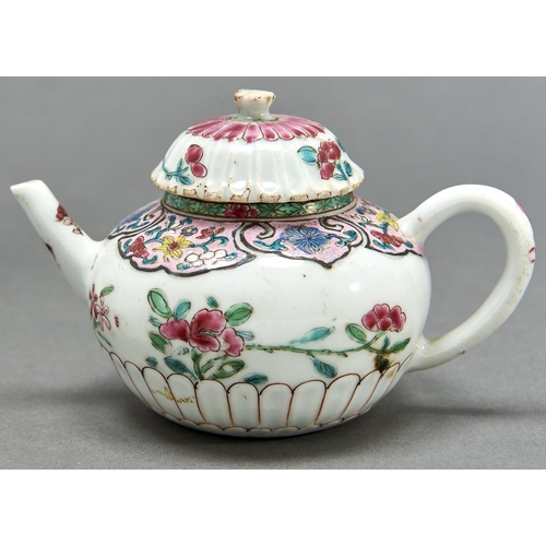 882 - A Chinese chrysanthemum moulded famille rose teapot and cover, Qing dynasty, Qianlong period, enamel... 