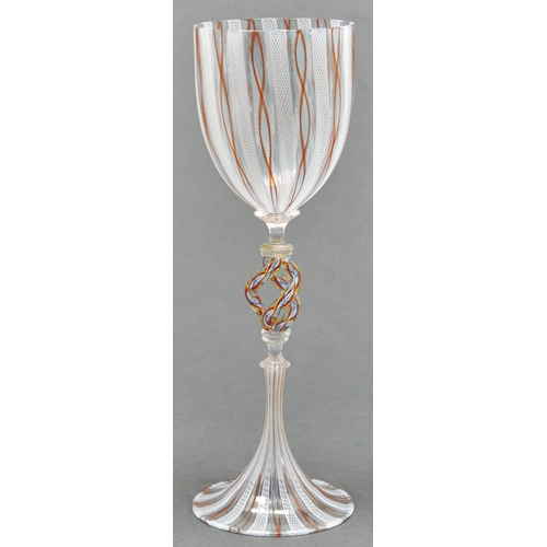 889 - A Venetian glass goblet, 20th c, with latticino bowl and trumpet foot, centred by three strand twist... 