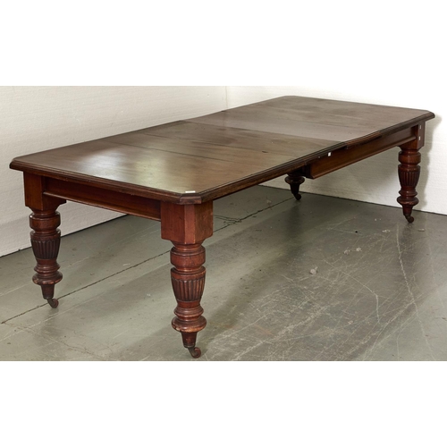 1537 - A Victorian mahogany dining table, on reeded bulbous legs and pottery castors, with leaves, 258cm l... 