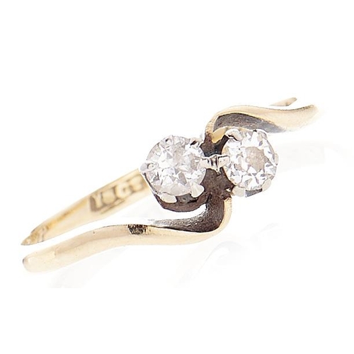 102 - A diamond crossover ring, in gold marked 18ct, 1.6g, size I