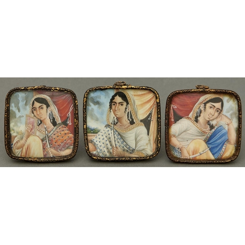 1023 - Indian School, 19th century - Three miniatures of ladies, 55 x 55mm and circa, giltmetal strut frame... 