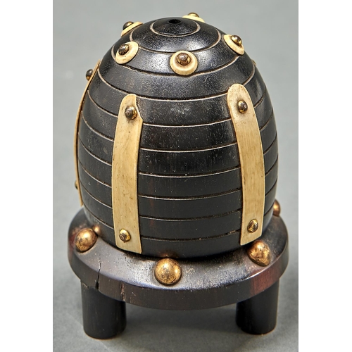 1028 - A Victorian turned ebony bee skep shaped thread box, mid 19th c, with gilt brass studded ivory strap... 