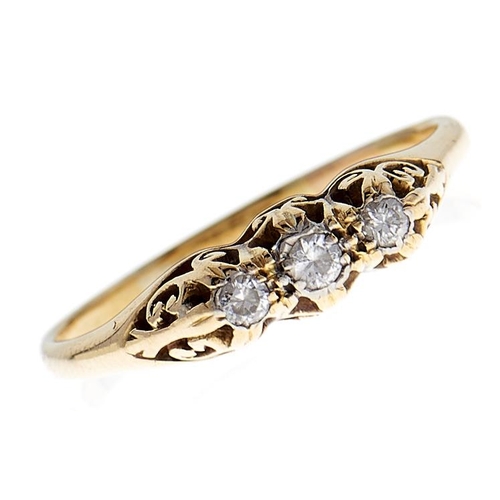 103 - A three stone diamond ring, in gold marked PLAT 18ct, 3.3g, size V