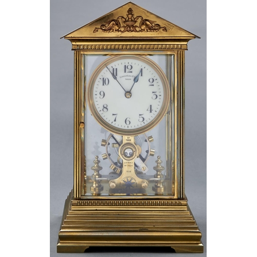 1034 - Eureka. A brass four glass electric mantel timepiece, No 7983, c1910, in architectural style case wi... 